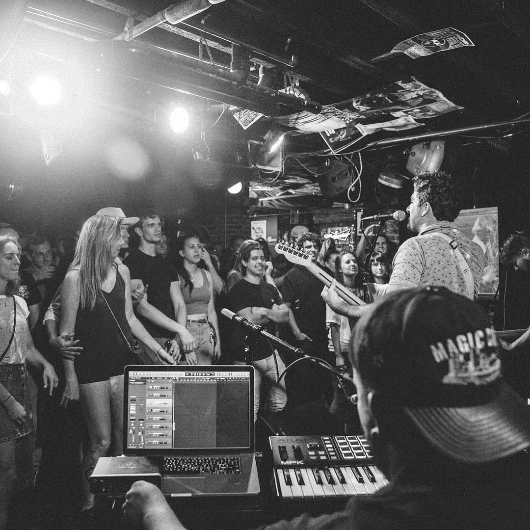 Hometown, newspaper ceiling, MPK on stage.