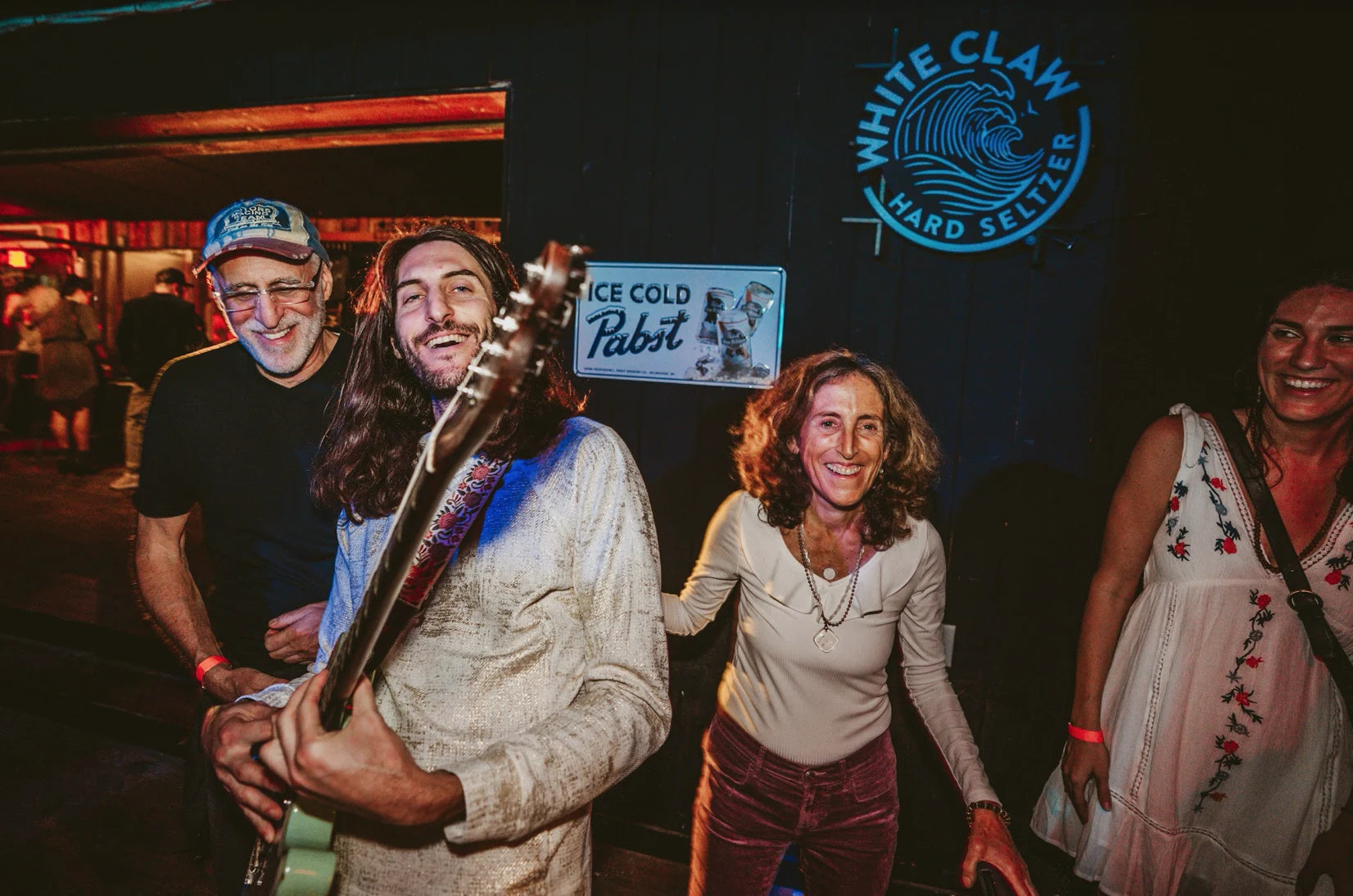 White Claw sign, Pabst sign, fan meetup.
