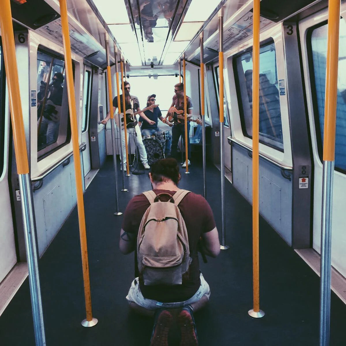 Playing acoustic on the downtown train.