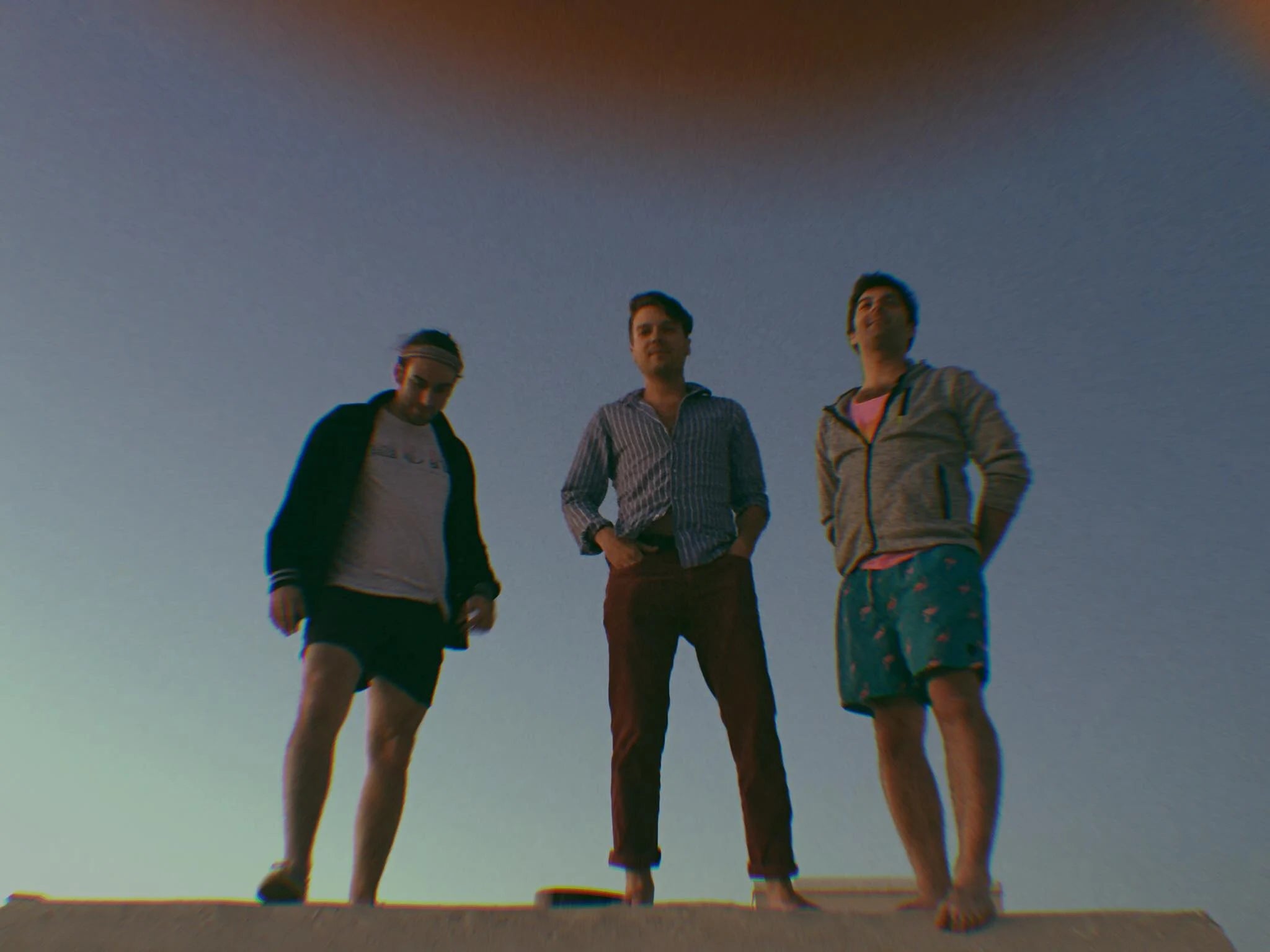 Three-piece, low-angle, magic hour.